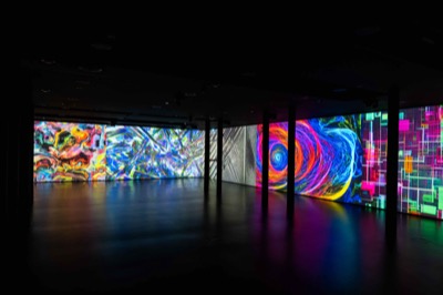 Understanding the Invisible exhibition at MEET Milan - visitors experiencing immersive NFT data visualization