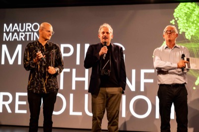 Understanding the Invisible exhibition at MEET Milan - visitors experiencing immersive NFT data visualization