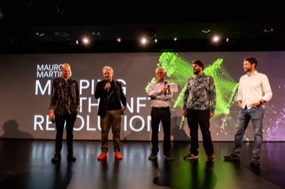 Understanding the Invisible exhibition at MEET Milan - visitors experiencing immersive NFT data visualization