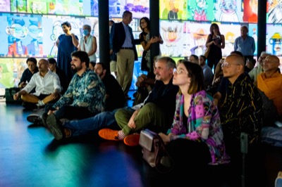 Understanding the Invisible exhibition at MEET Milan - visitors experiencing immersive NFT data visualization