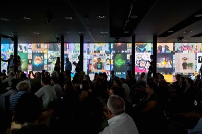 Understanding the Invisible exhibition at MEET Milan - visitors experiencing immersive NFT data visualization