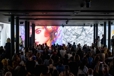 Understanding the Invisible exhibition at MEET Milan - visitors experiencing immersive NFT data visualization